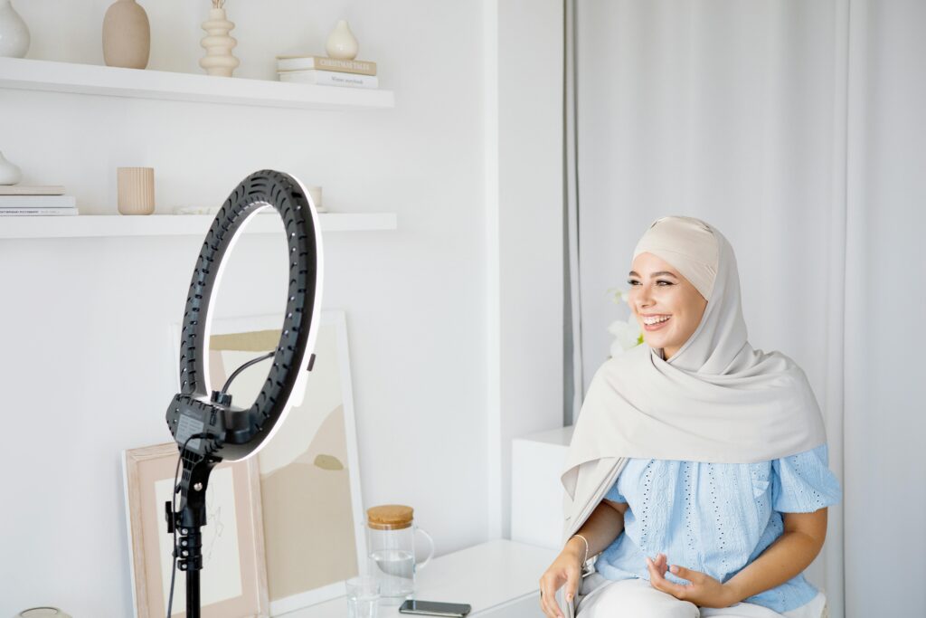 A muslim influencer recording a collaboration video.