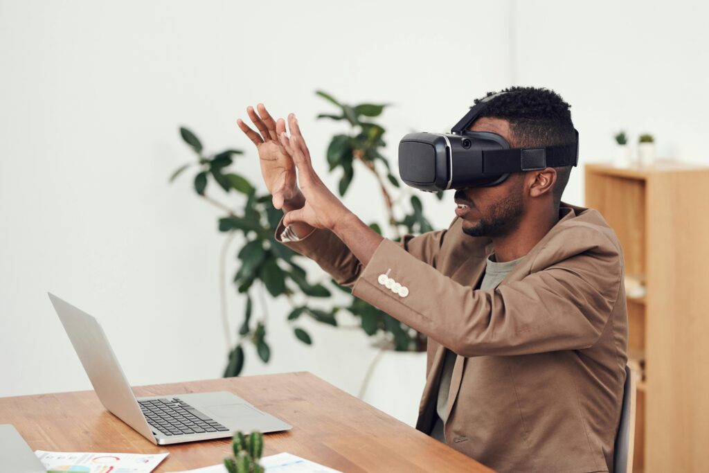 A man using virtual reality goggles.