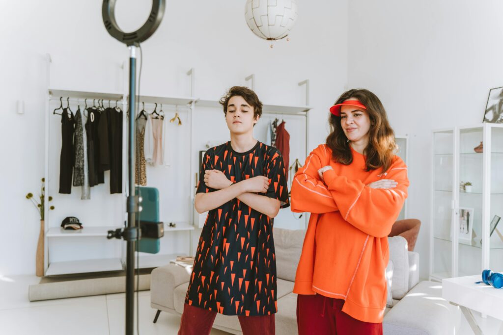 A micro-influencer mom with her son recording a reel for her Instagram followers.