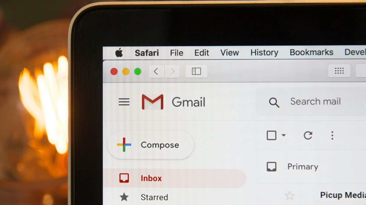 A laptop displaying emails on Gmail.